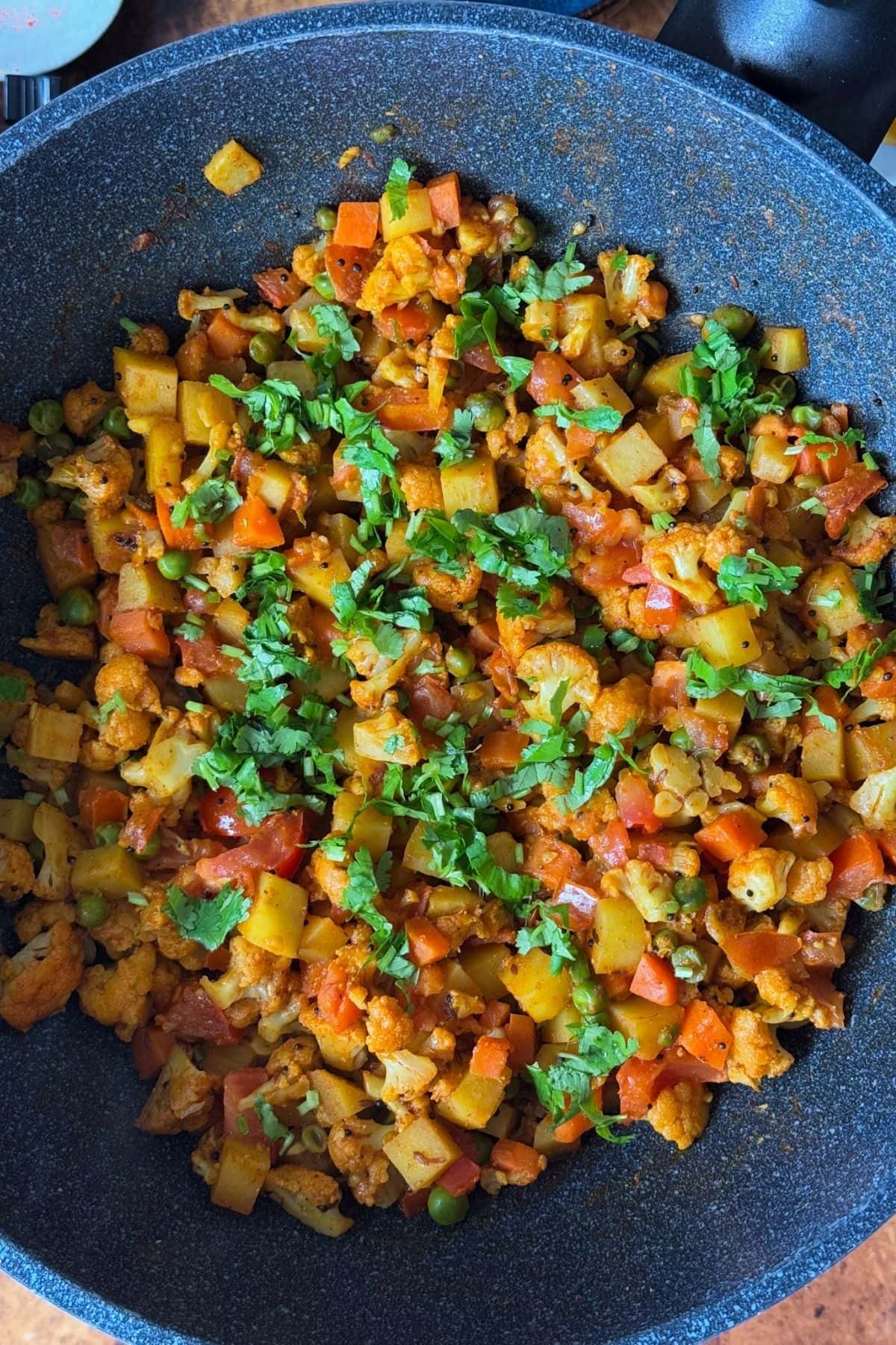 Flower bataka nu shaak (stir fry cauliflower-potato dry curry).